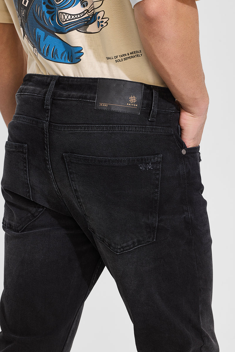 Black distressed skinny jeans online