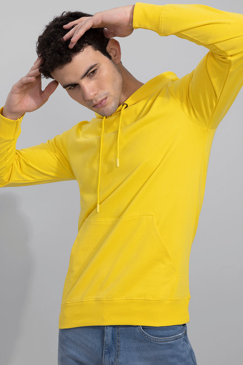 Buy Men s Solid Yellow Hoodie Online SNITCH