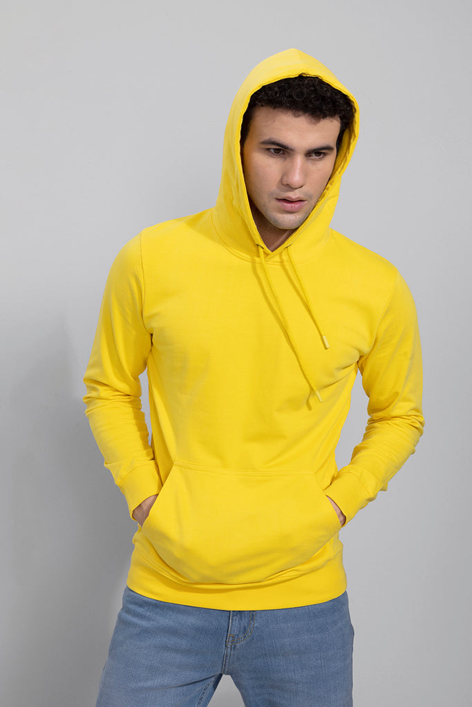 Buy Men s Solid Yellow Hoodie Online SNITCH